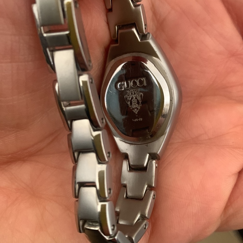 A Gucci silver watch with stone glasses and numbers it’s like new. - Picture 4 of 5